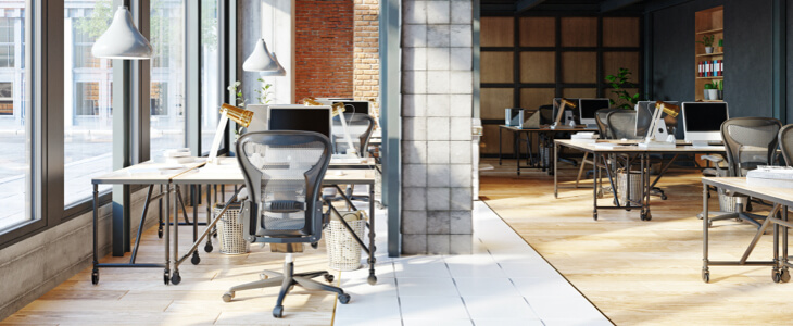 Modern office interior with rows of desks