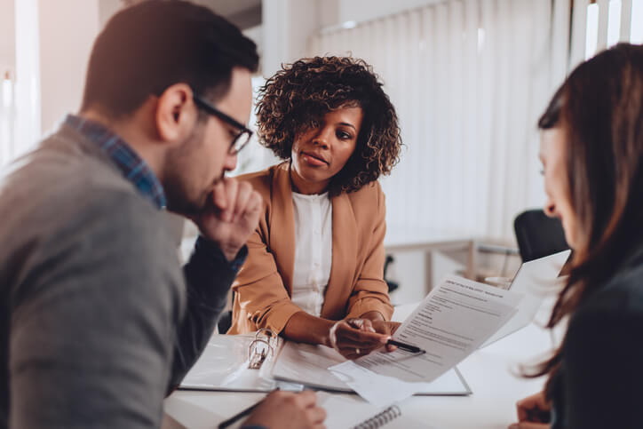 Clients preparing to sign a contract